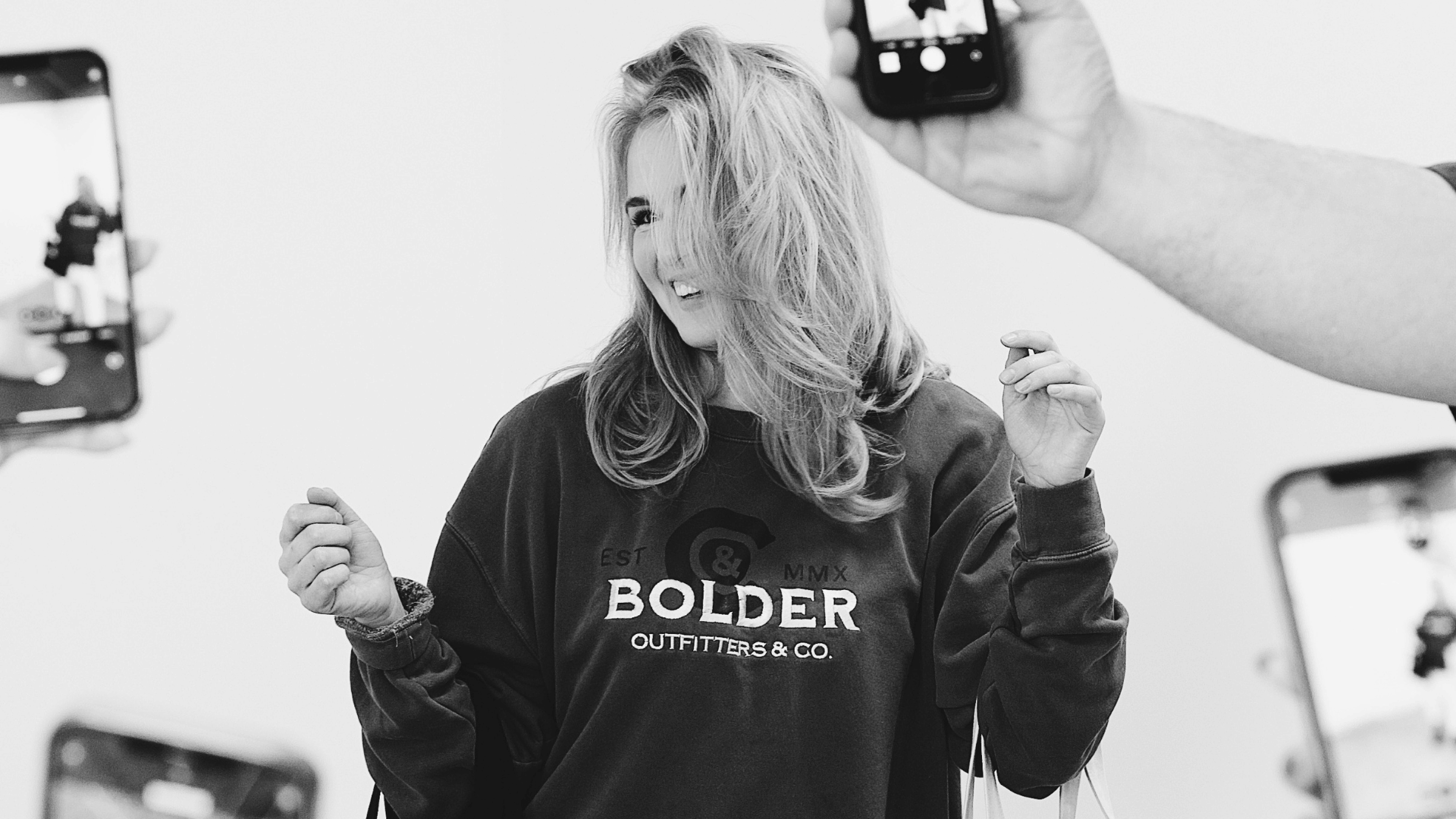 woman wearing screen printed and embroidered hoodie